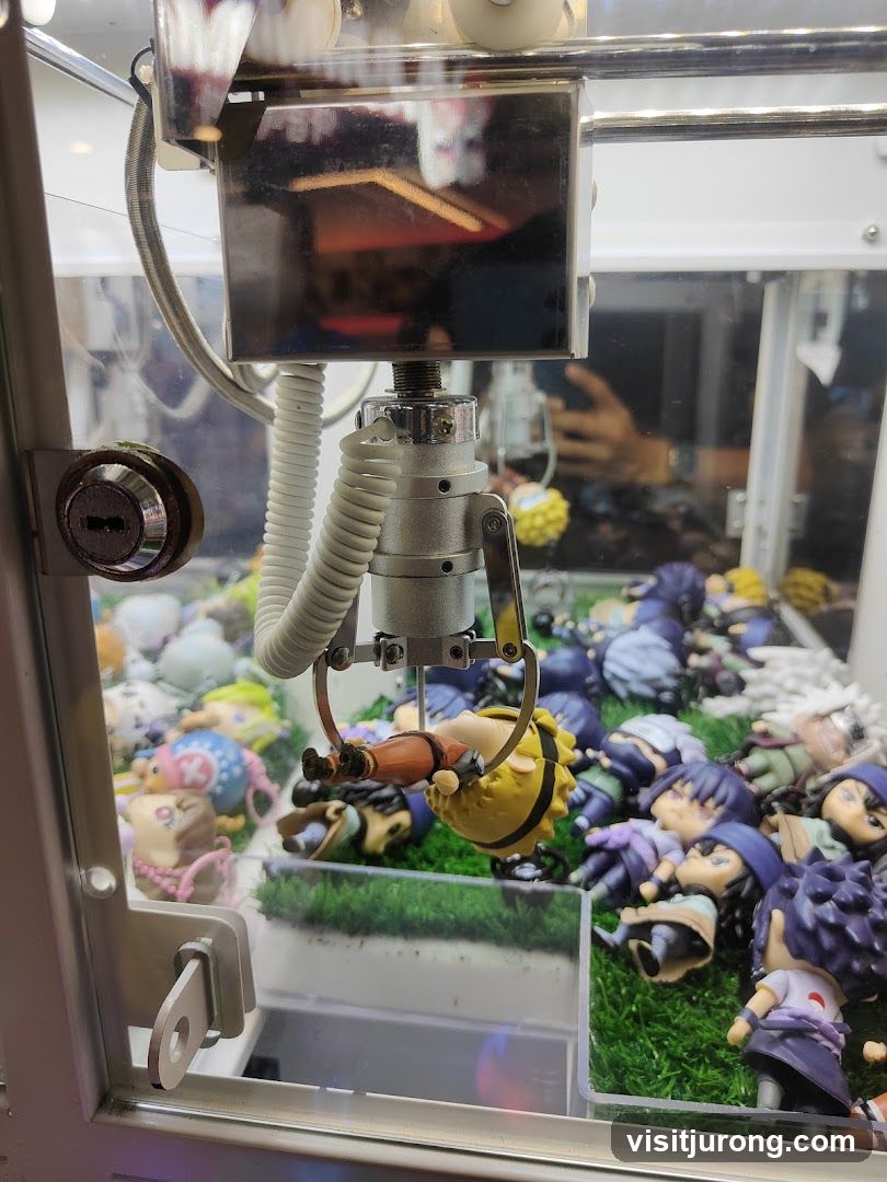 Claw Machine with Anime Figurines