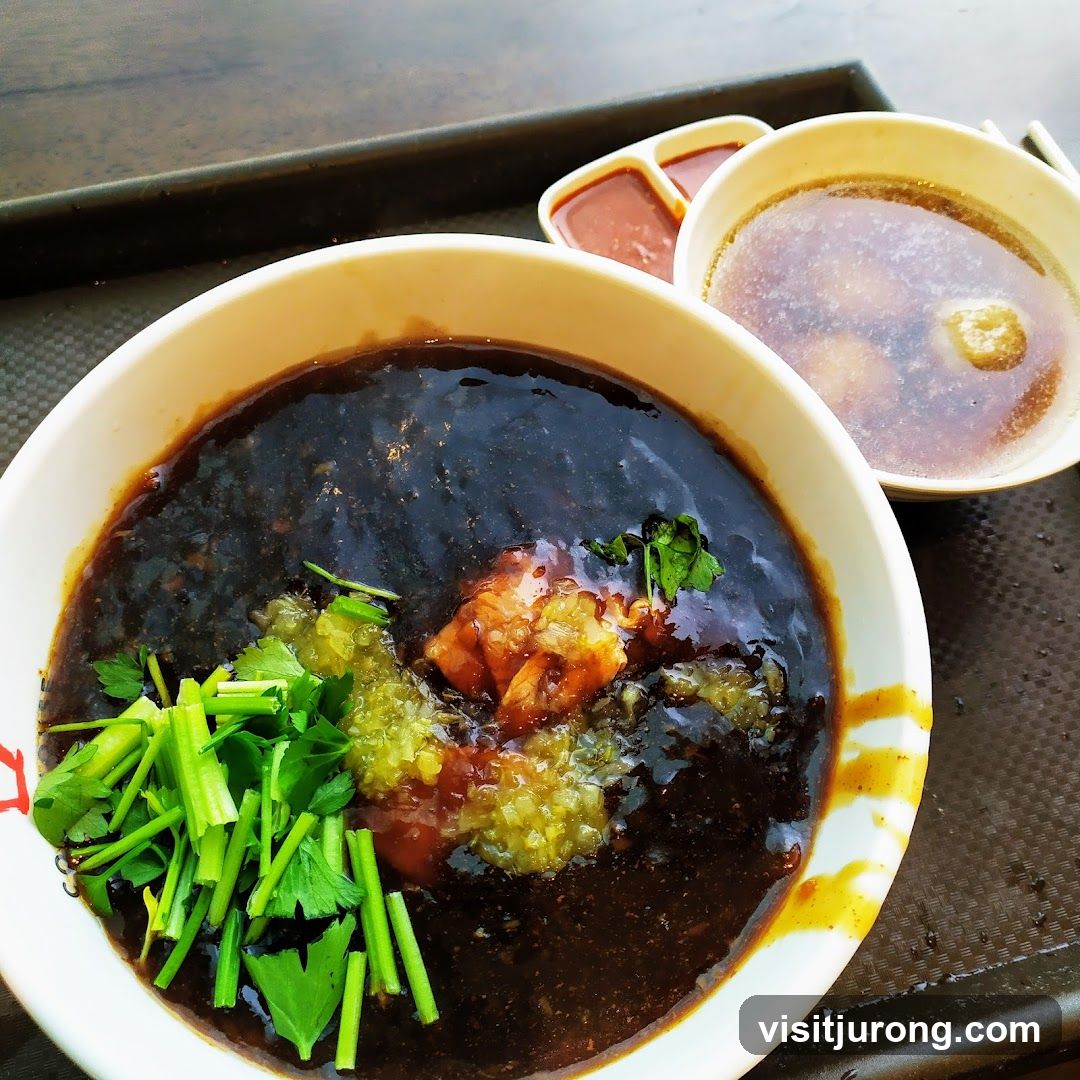 Dark Noodle Dish with Soup and Sauces