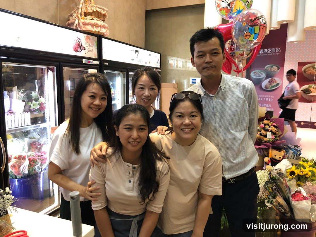 Group Photo with Flowers and Balloons