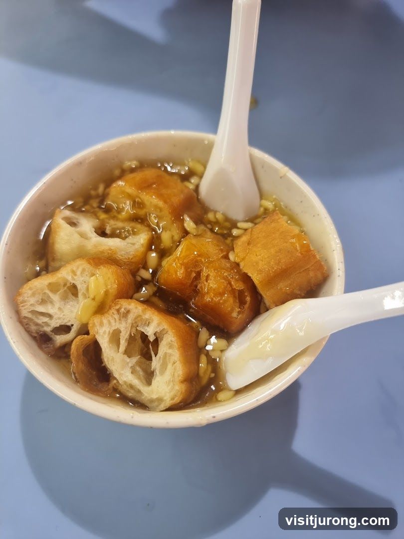 Bowl of dessert with fried dough sticks