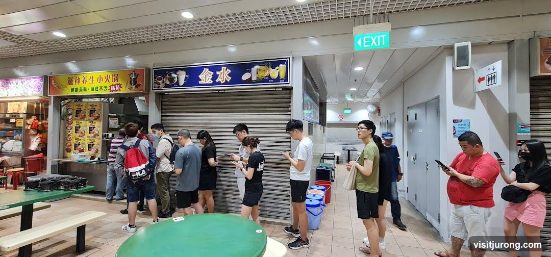 People queuing at food stalls