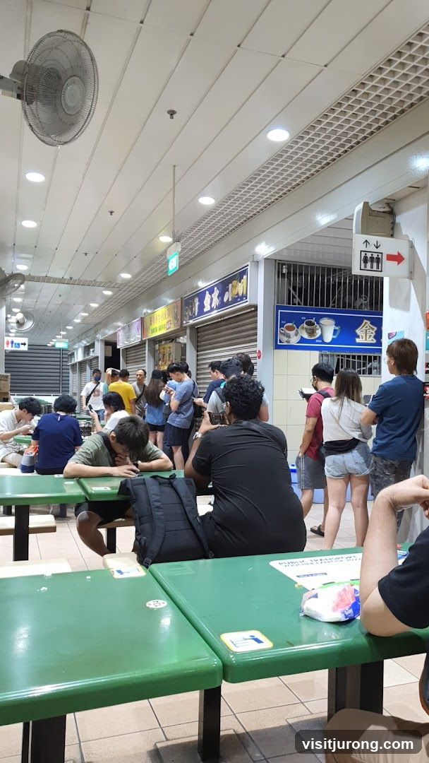 Food court with people queuing