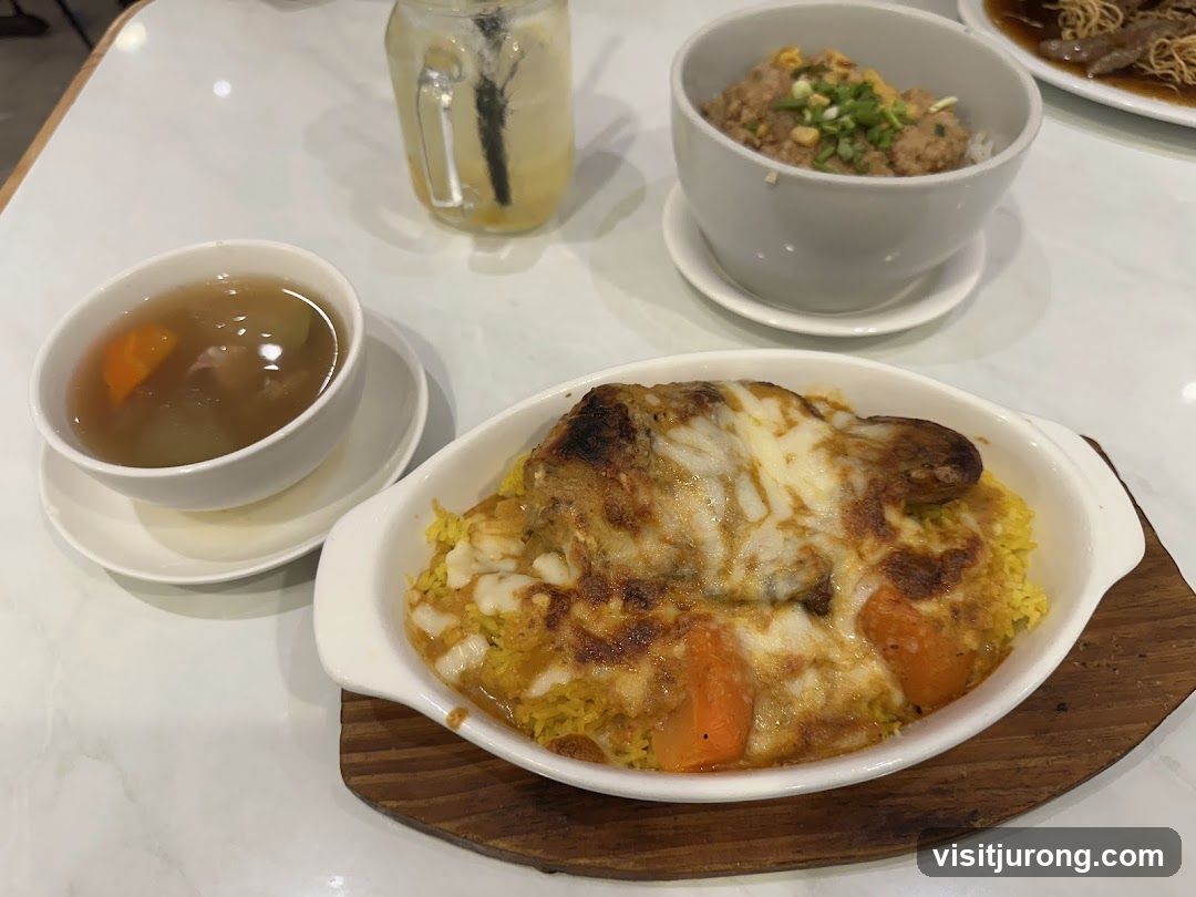 Baked Rice Dish with Soup and Drink
