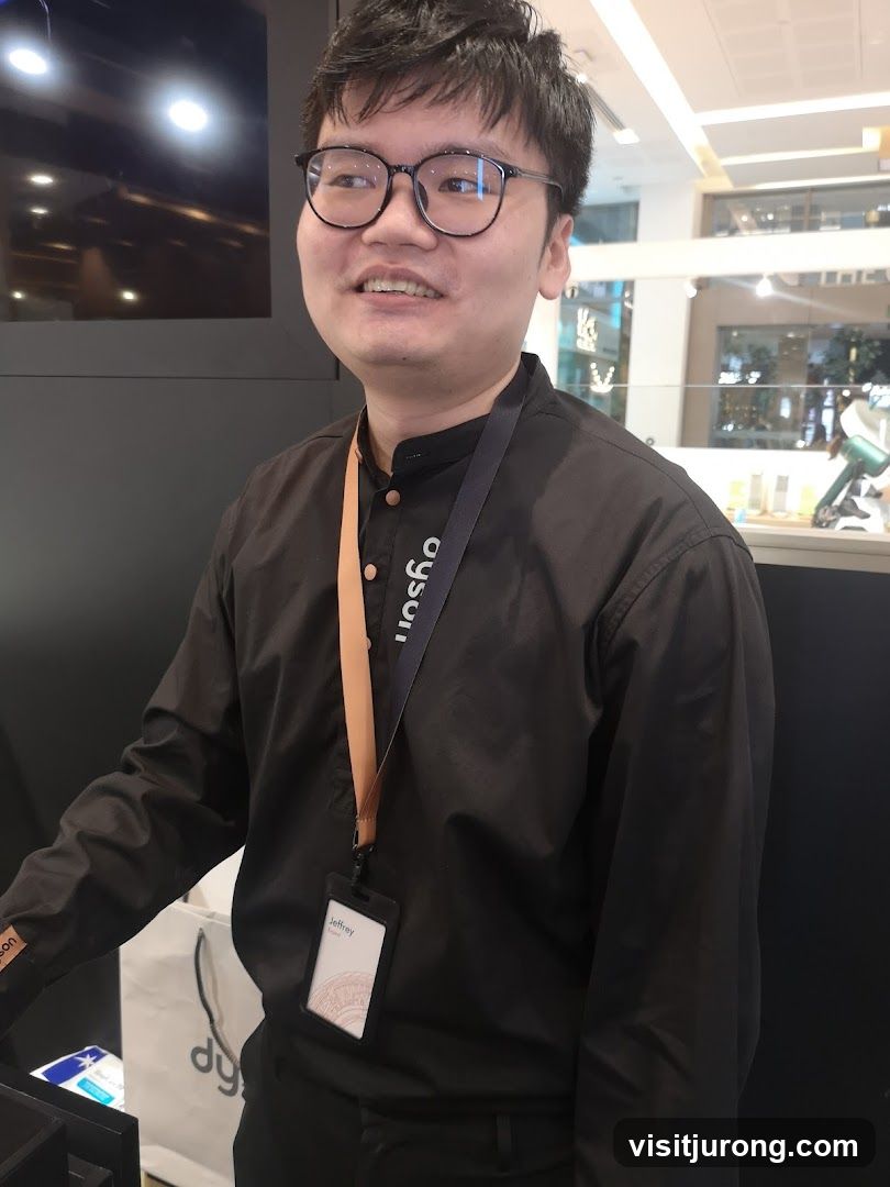 Employee wearing a black shirt with a lanyard