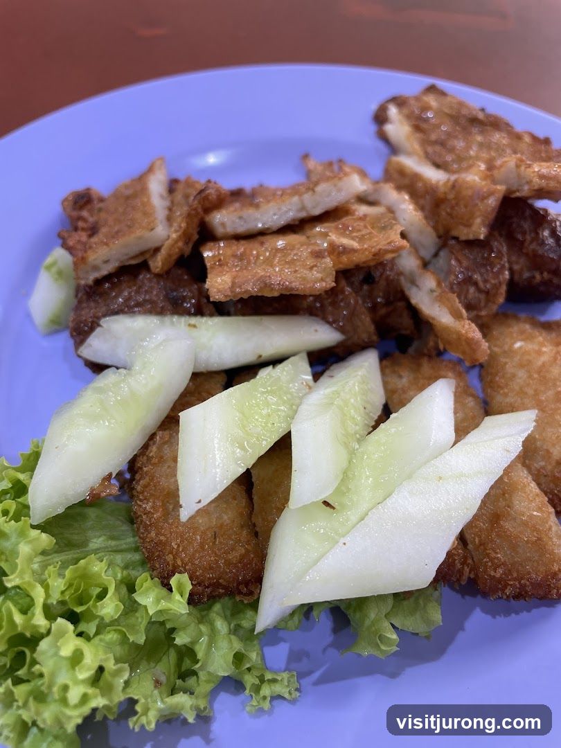 Fried Fish Cakes with Cucumber and Lettuce