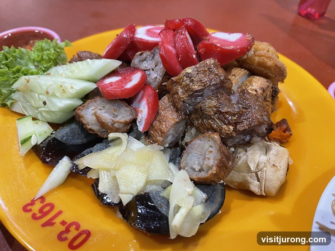 Plate of Assorted Fried Snacks and Century Egg