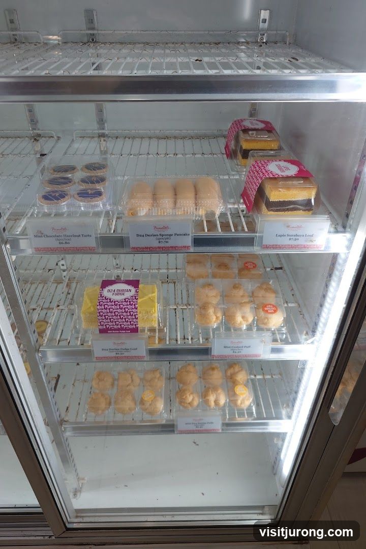 Assortment of Pastries in a Refrigerator Display