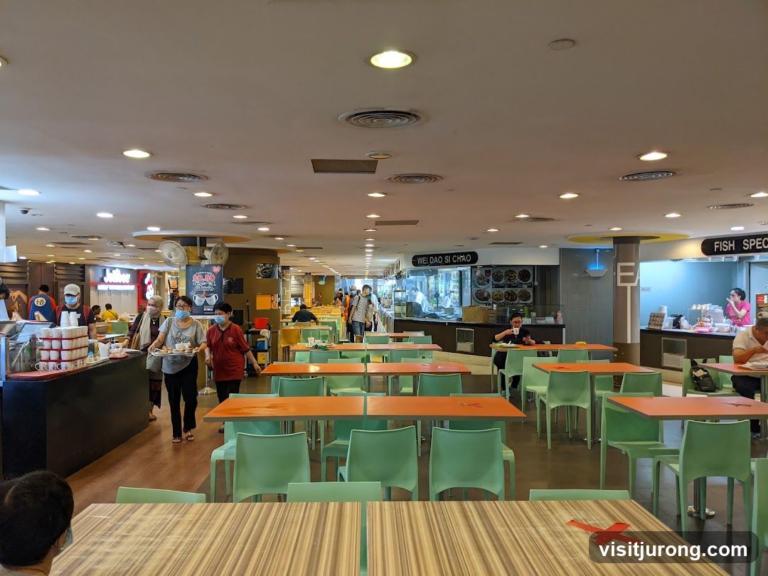 Food court with tables and food stalls