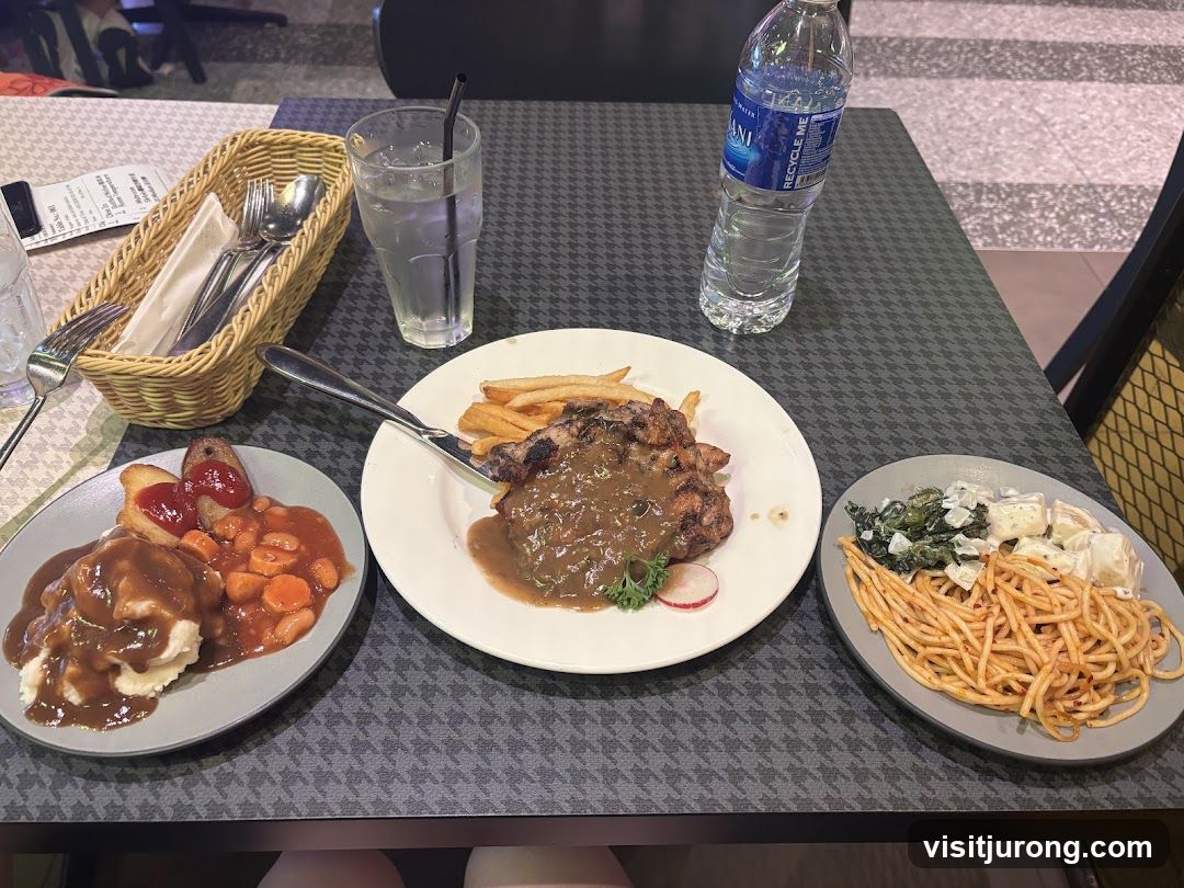 Table with three meals and a bottle of water