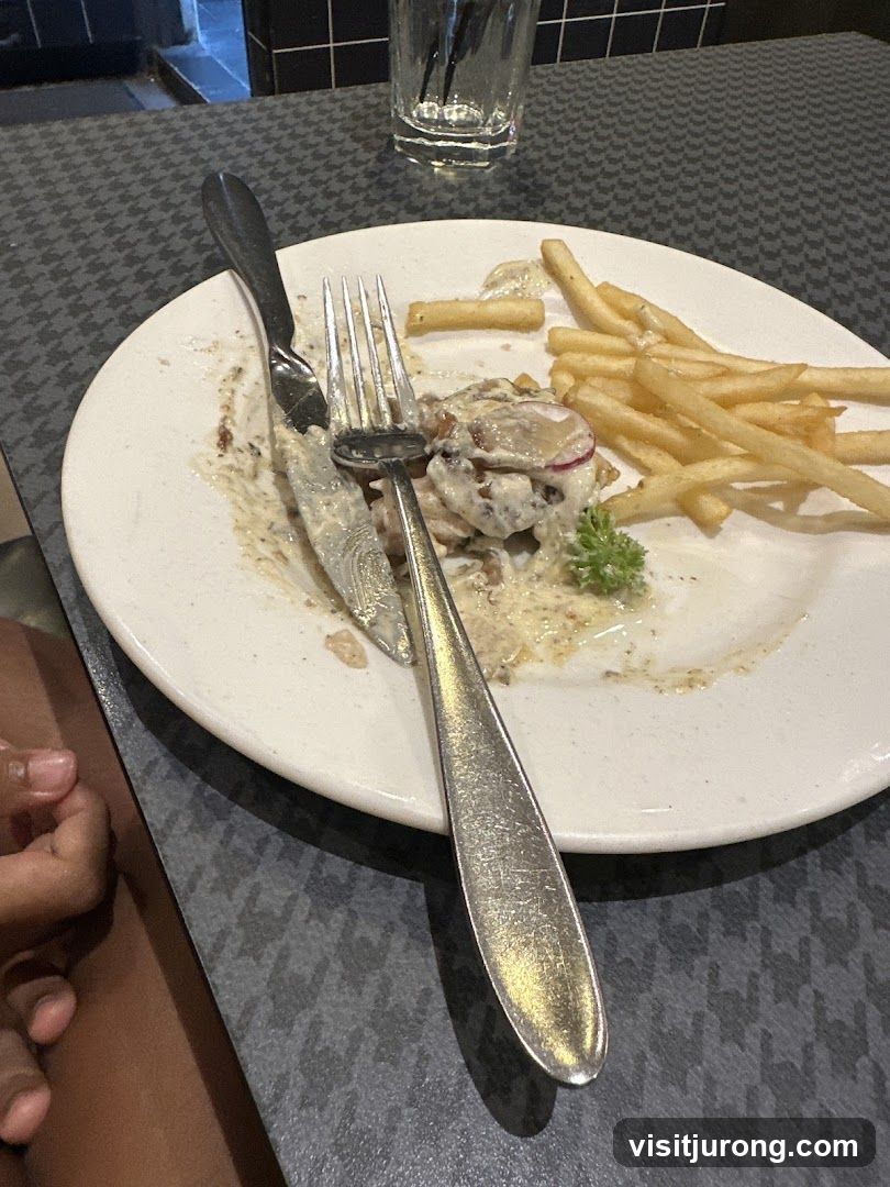 Partially Eaten Meal with Fries
