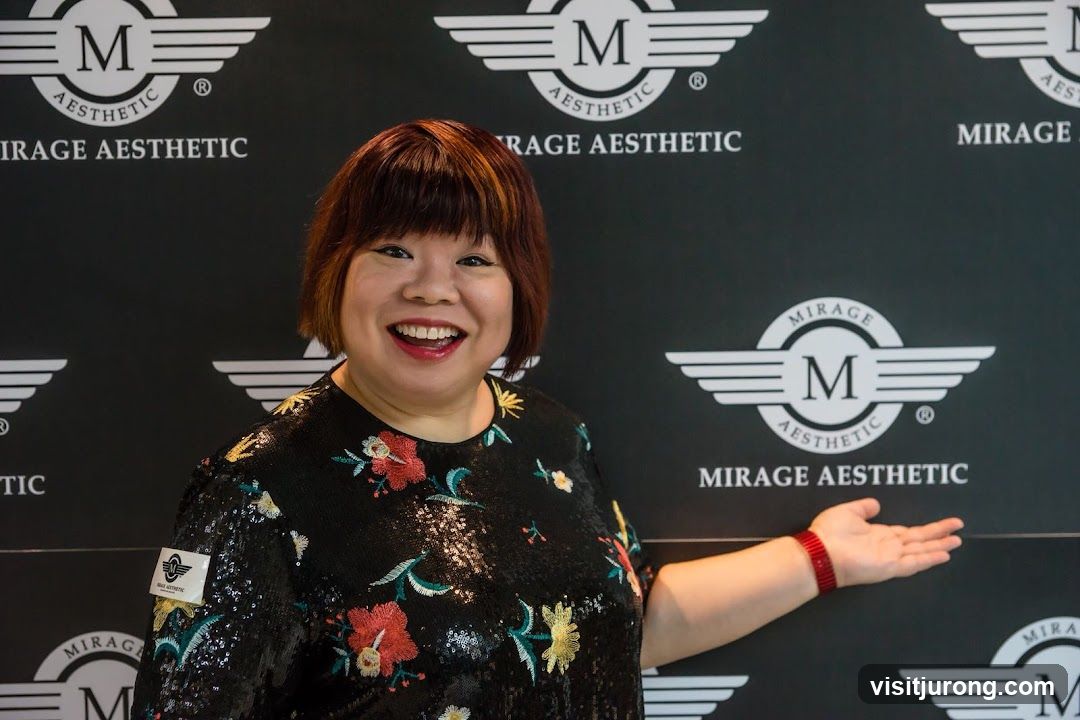 Woman Posing in Front of Mirage Aesthetic Logo