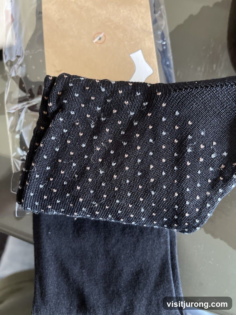 Black socks with small heart pattern