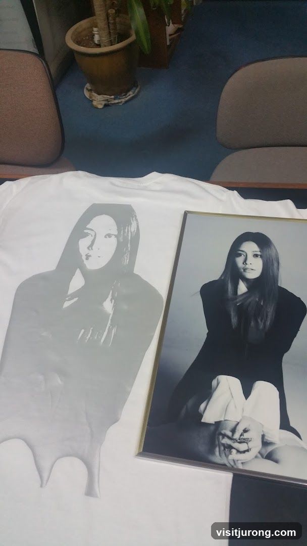 T-shirt and framed photo with portrait