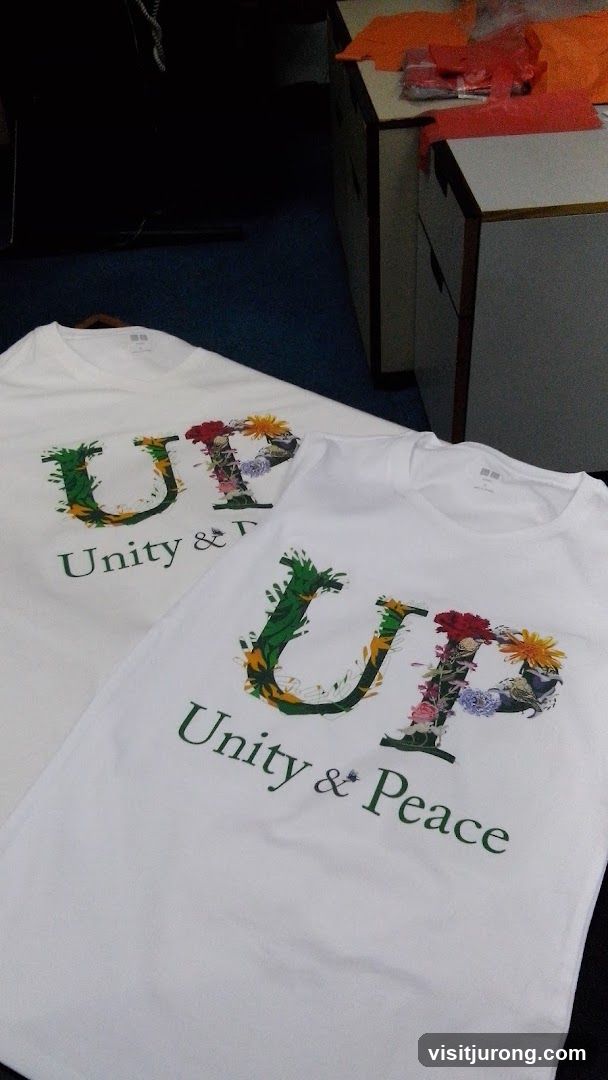 T-shirts with floral "UP" logo