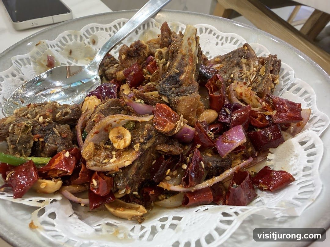 Spicy Fried Duck with Chilies and Onions