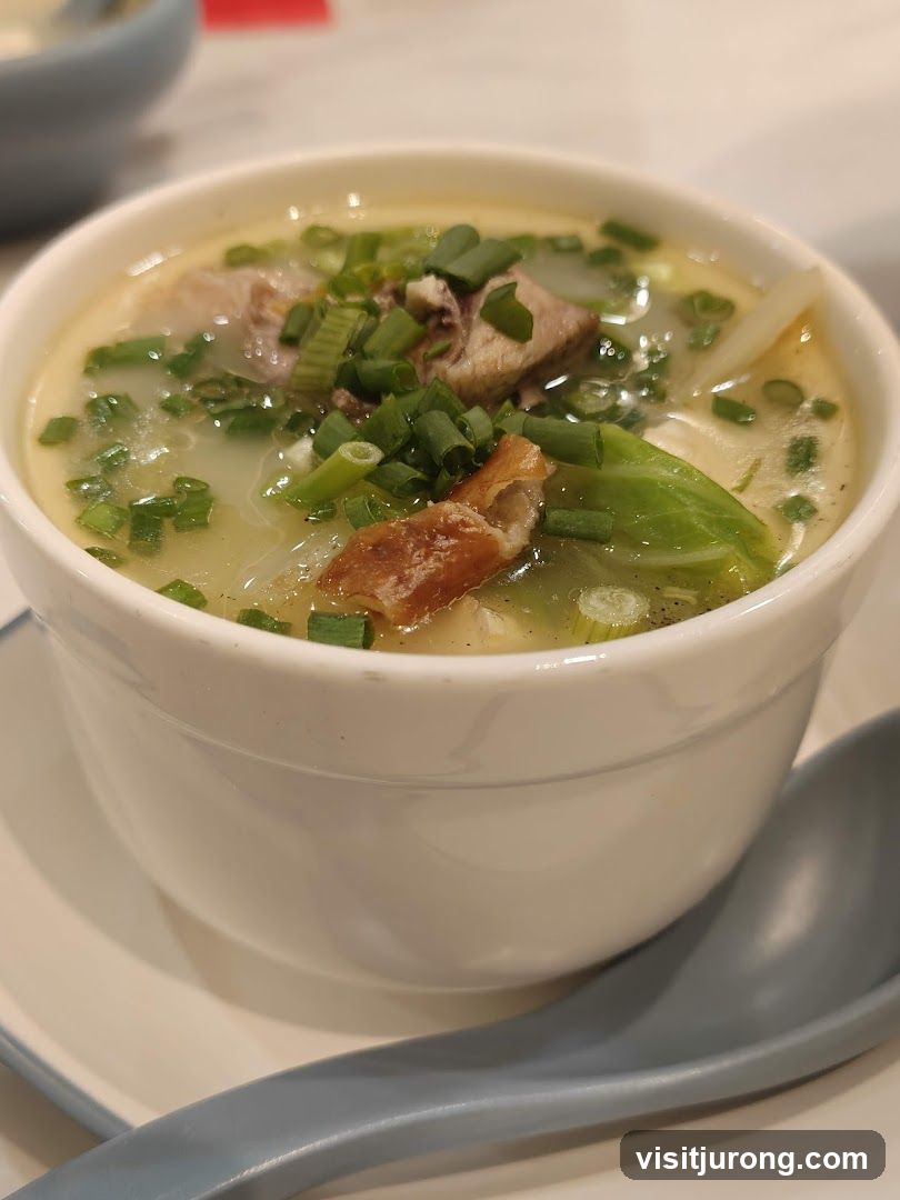 Bowl of soup with meat and vegetables
