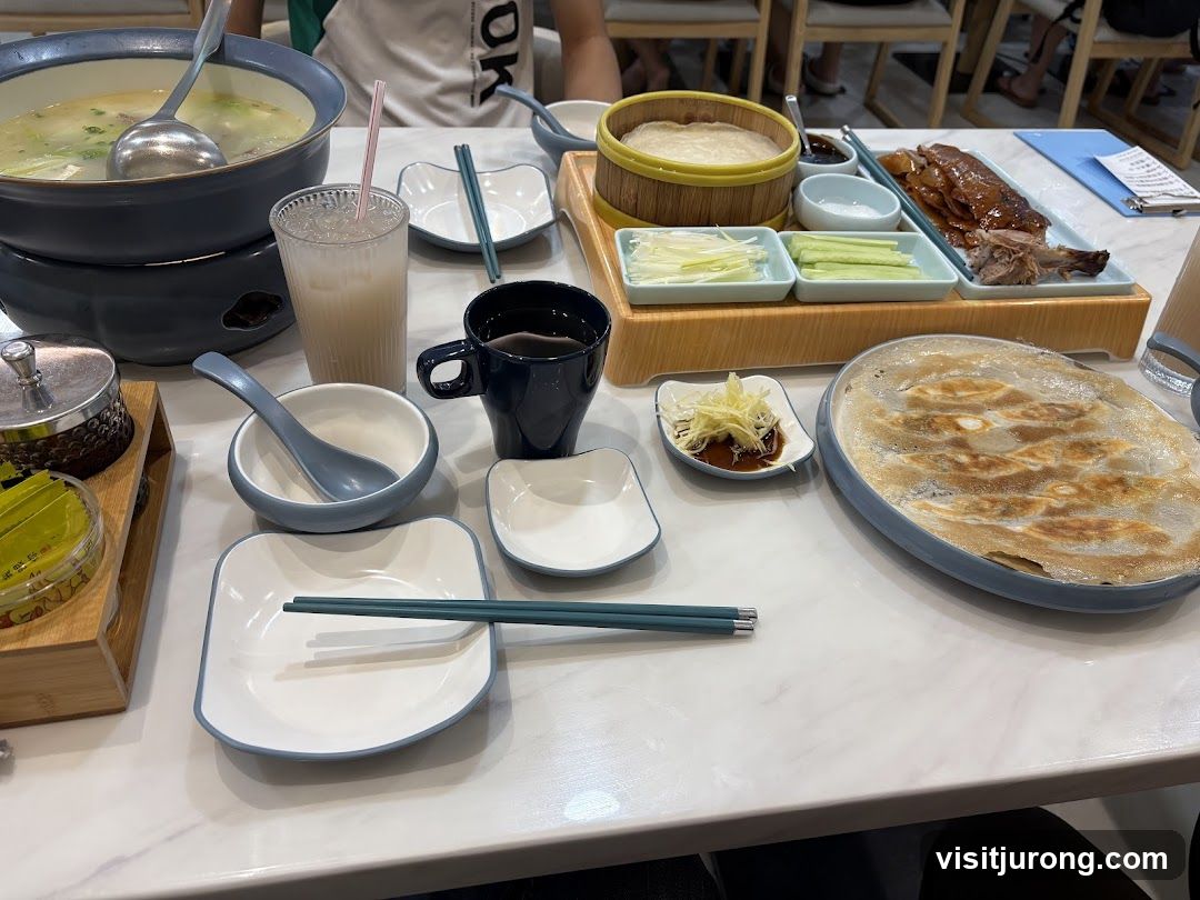 Table with Peking Duck and Dumplings