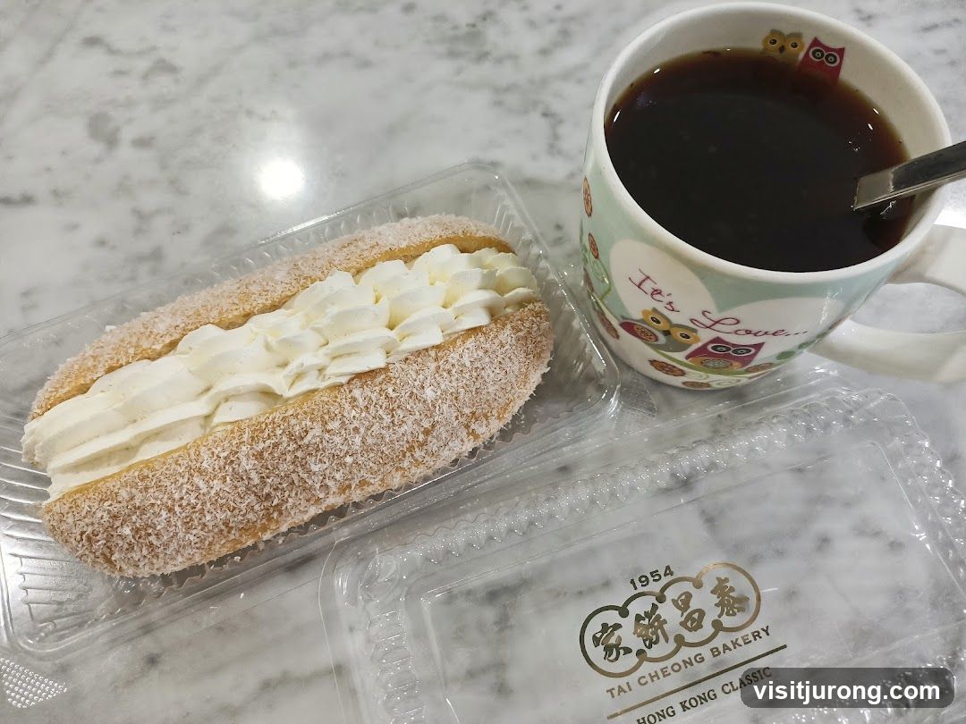 Cream-filled pastry and coffee