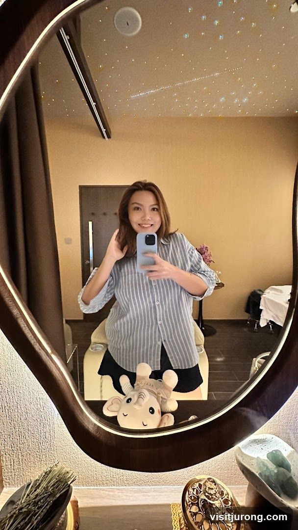 Woman taking a mirror selfie
