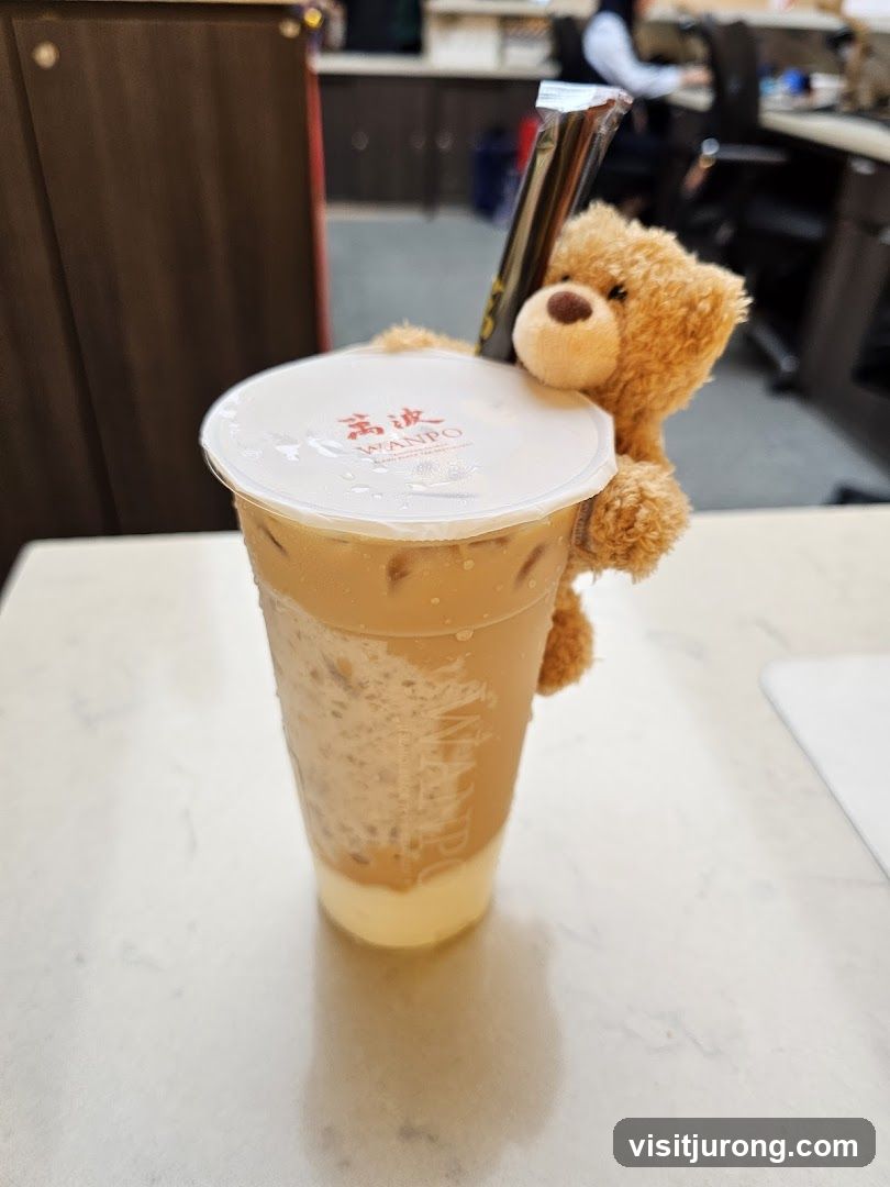 Beverage with Teddy Bear Charm
