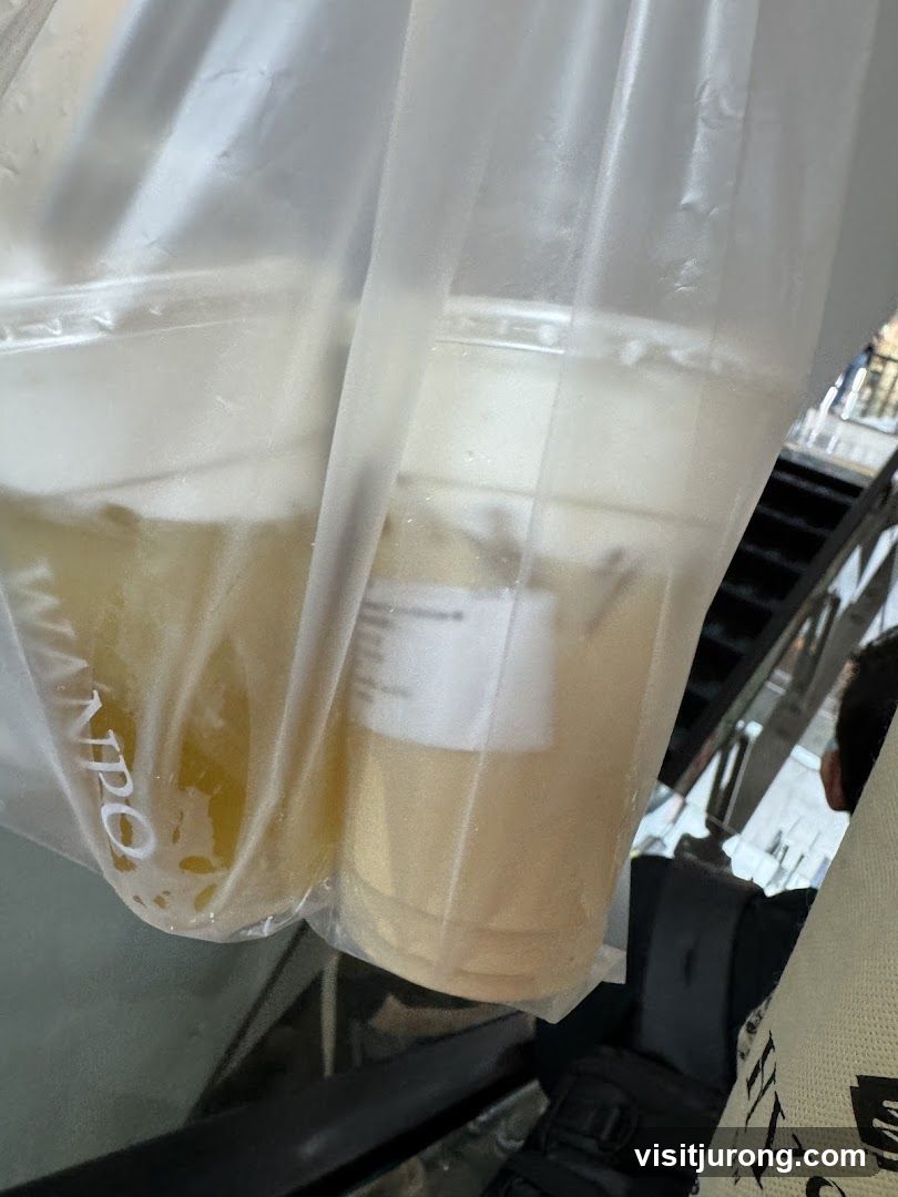 Two drinks in a plastic bag