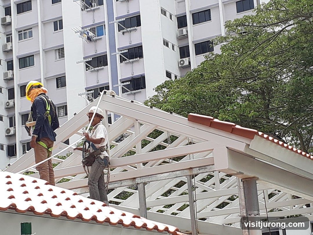 Construction Workers on Roof