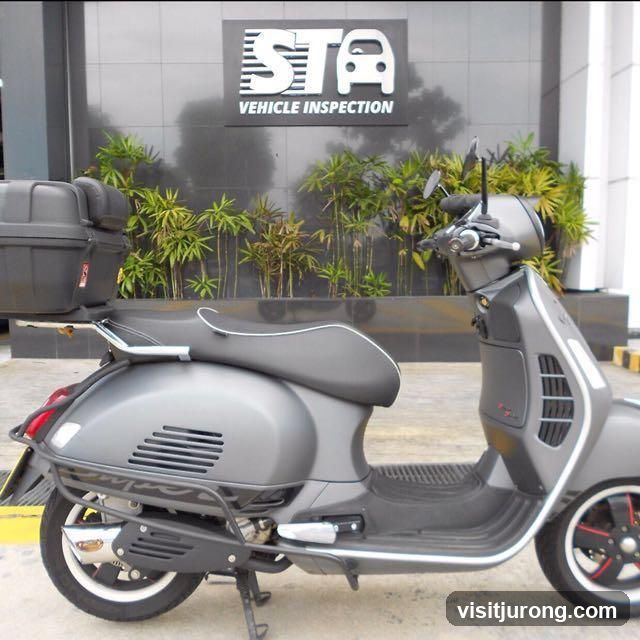 Scooter in front of Vehicle Inspection Center