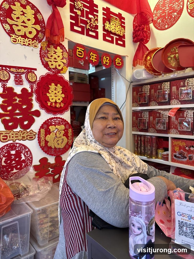 Woman in a shop decorated for Chinese New Year