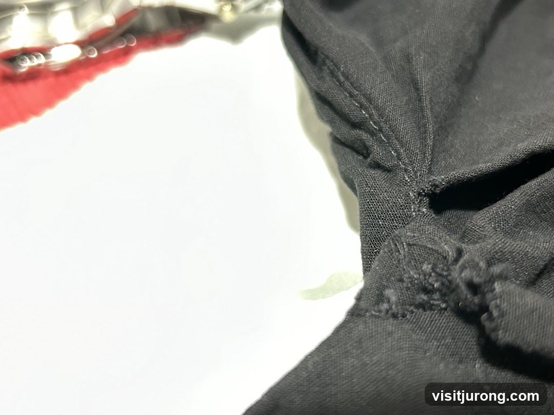 Close-up of black fabric with stitching