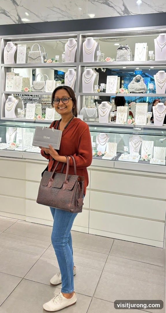 Woman holding a shopping bag in a jewelry store