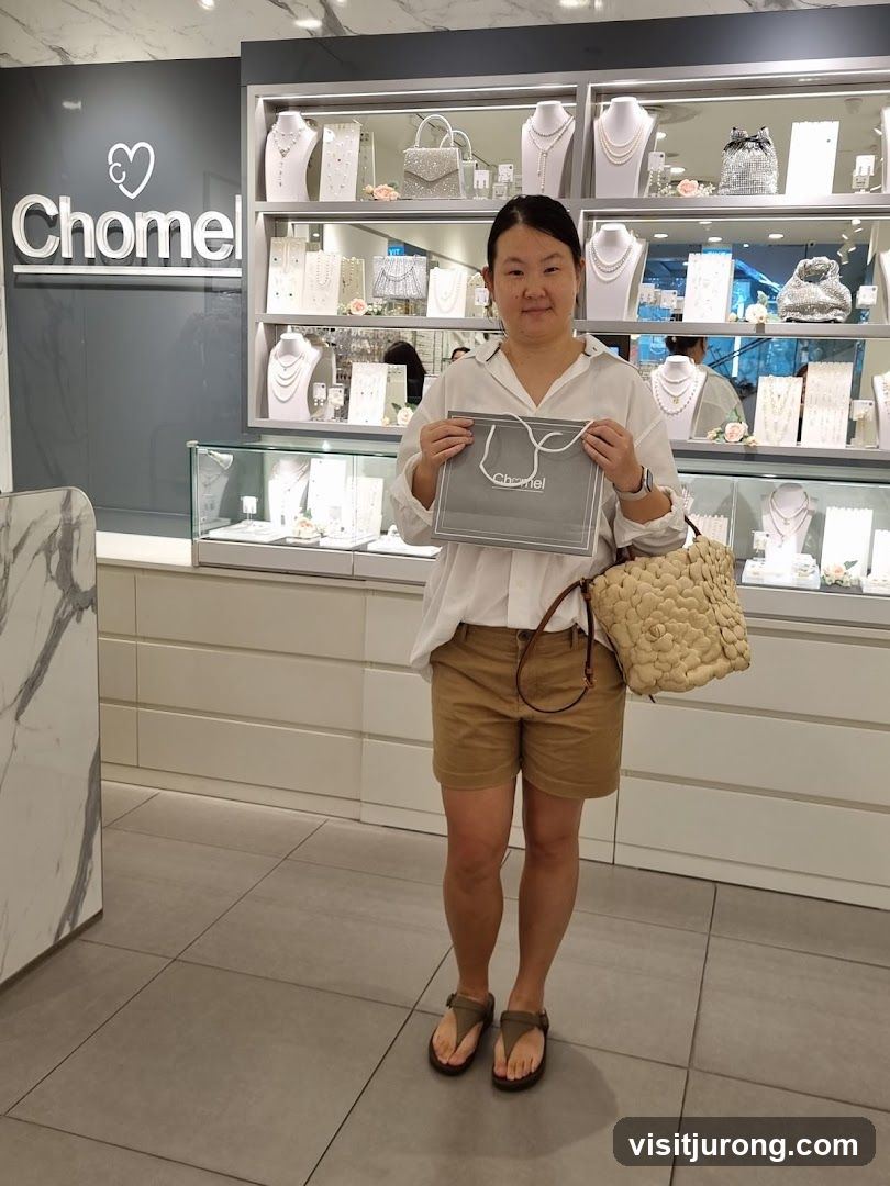 Woman holding a shopping bag in a jewelry store