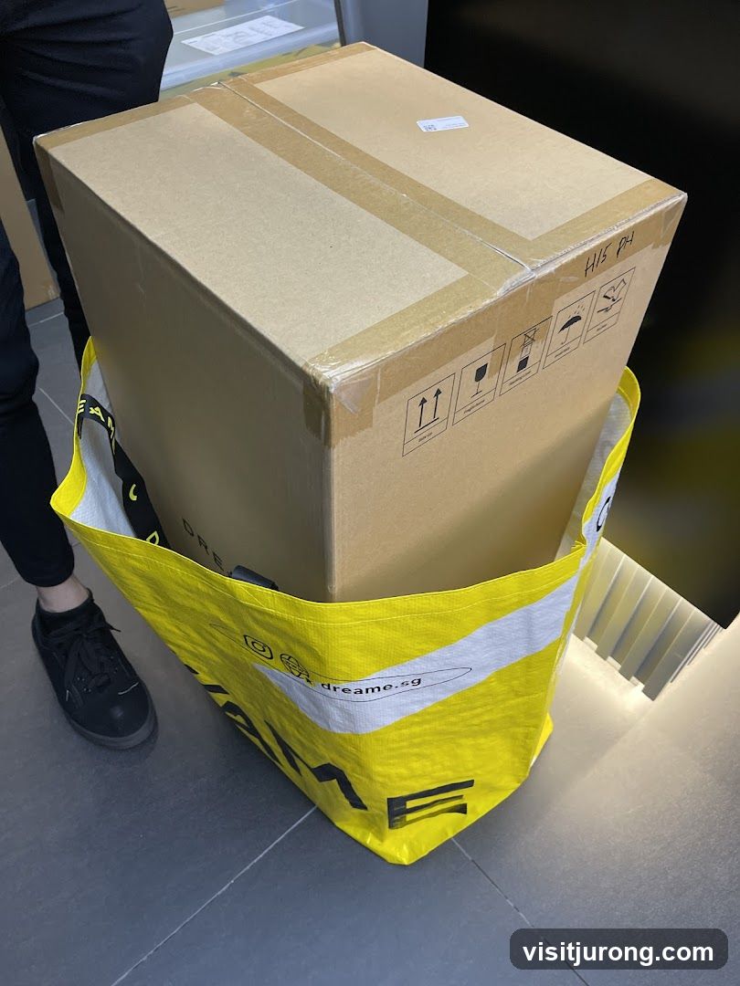 Cardboard box in a branded tote bag