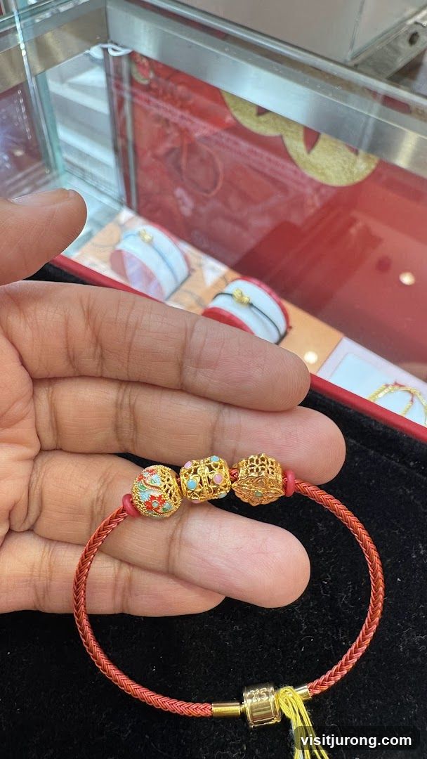 Gold Bracelet with Charms