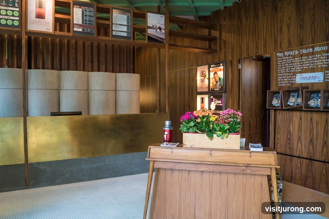 Interior of a shop with wooden walls and a counter