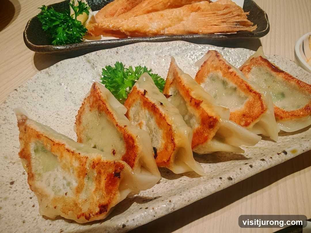Pan-fried dumplings and fried fish