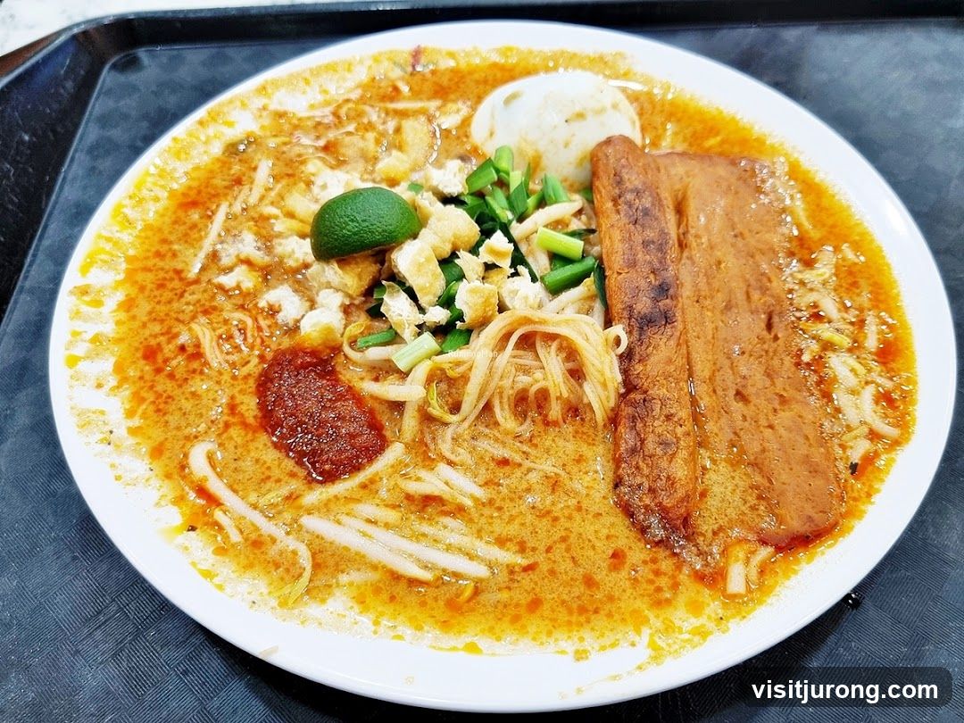 Laksa with Fried Fish Cake and Egg