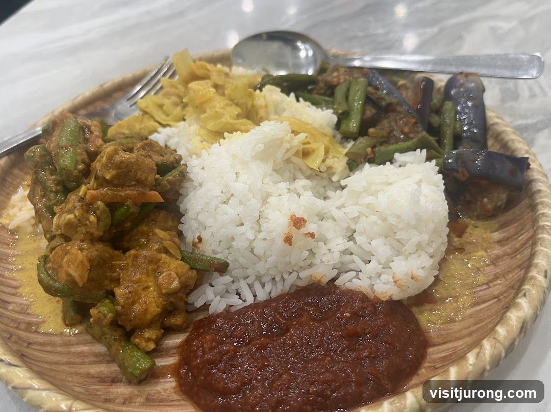 Plate of Rice with Curries and Sambal