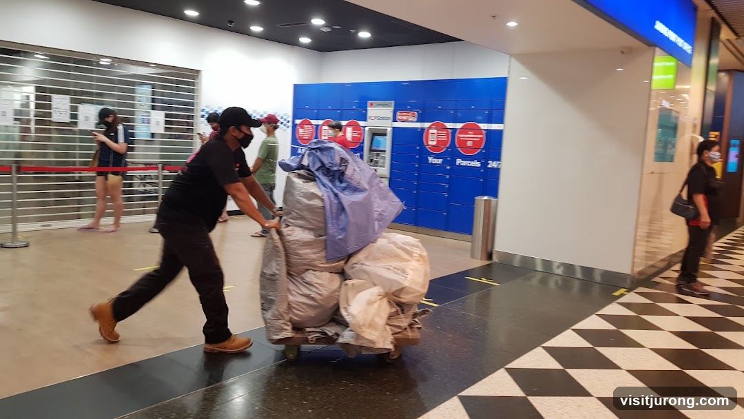 Parcel lockers and people in a mall