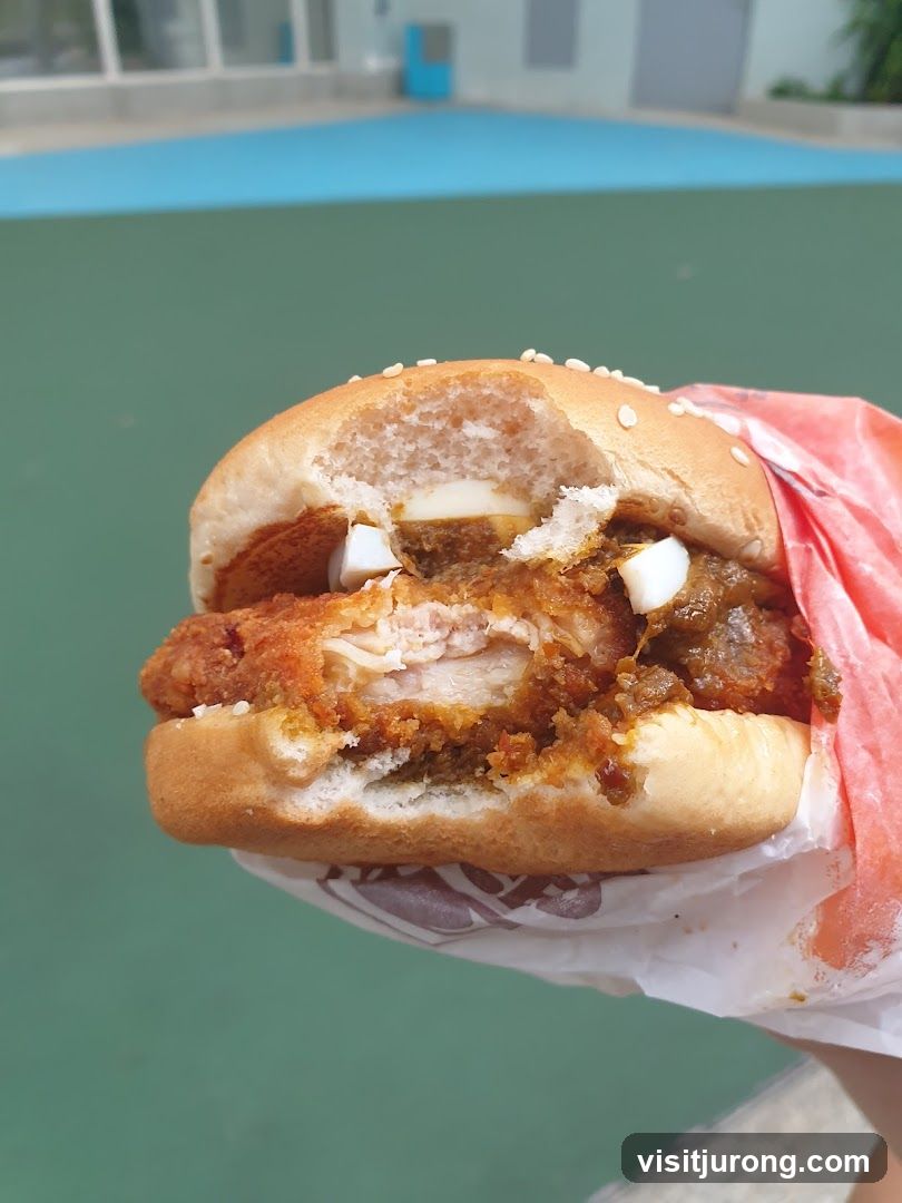Burger with Fried Chicken and Curry