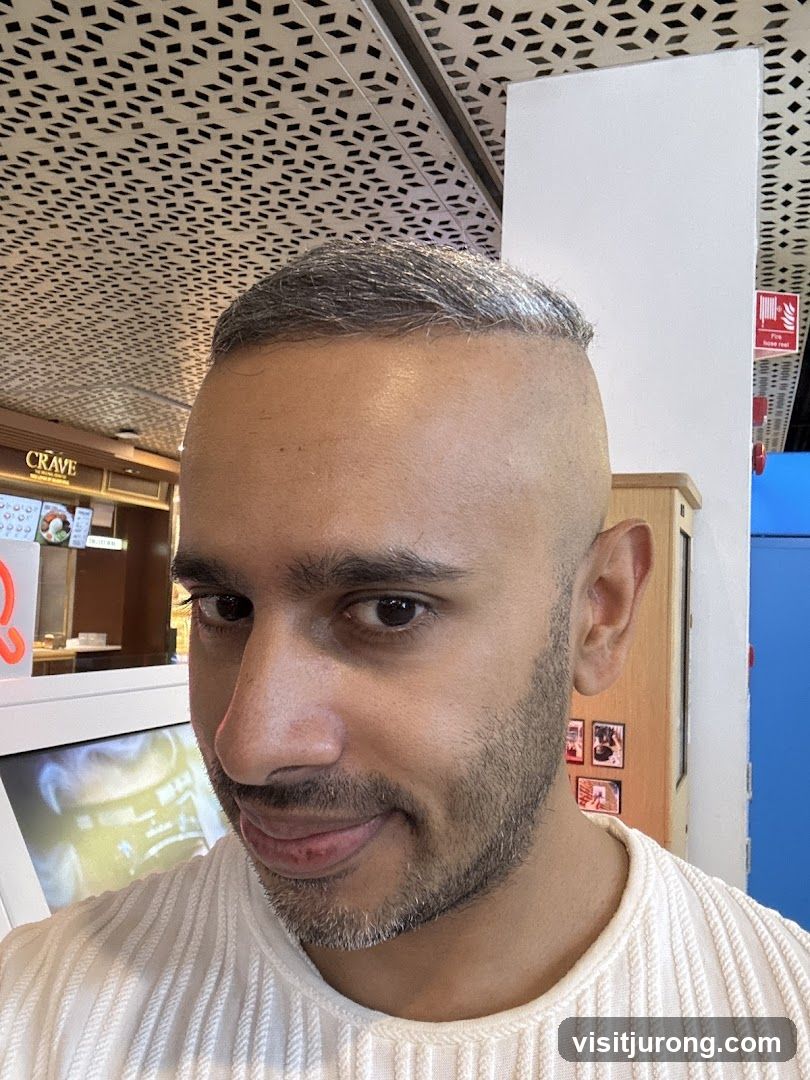 Man in front of a food establishment