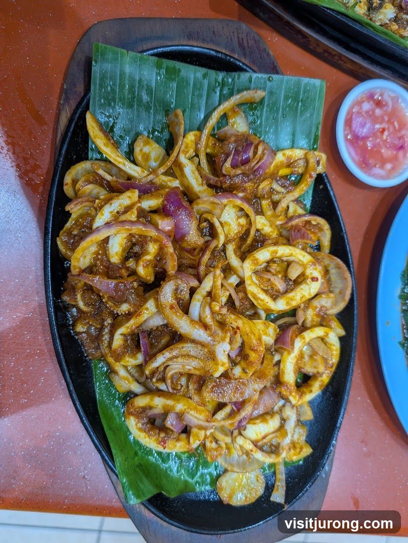 Sizzling Squid with Onions
