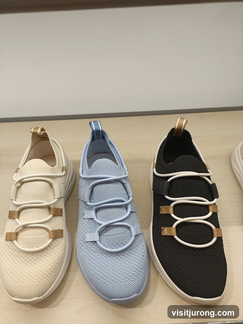 Three pairs of knit sneakers