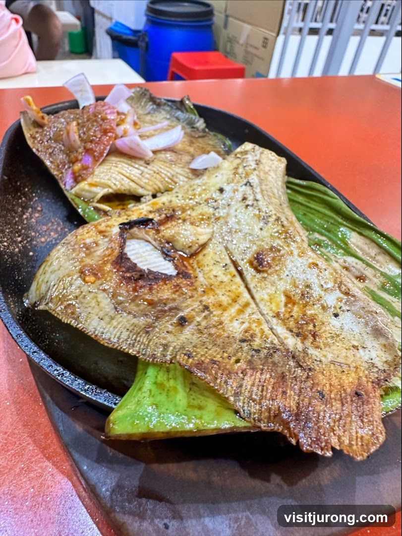 Grilled Fish with Onions and Sauce