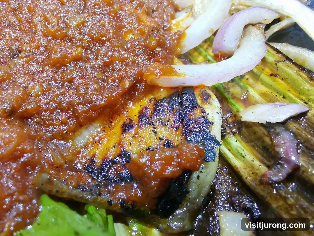 Grilled Fish with Sauce and Onions