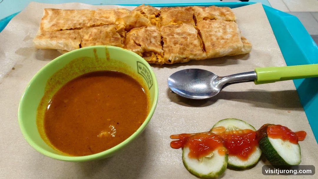 Murtabak with Curry and Cucumber Slices