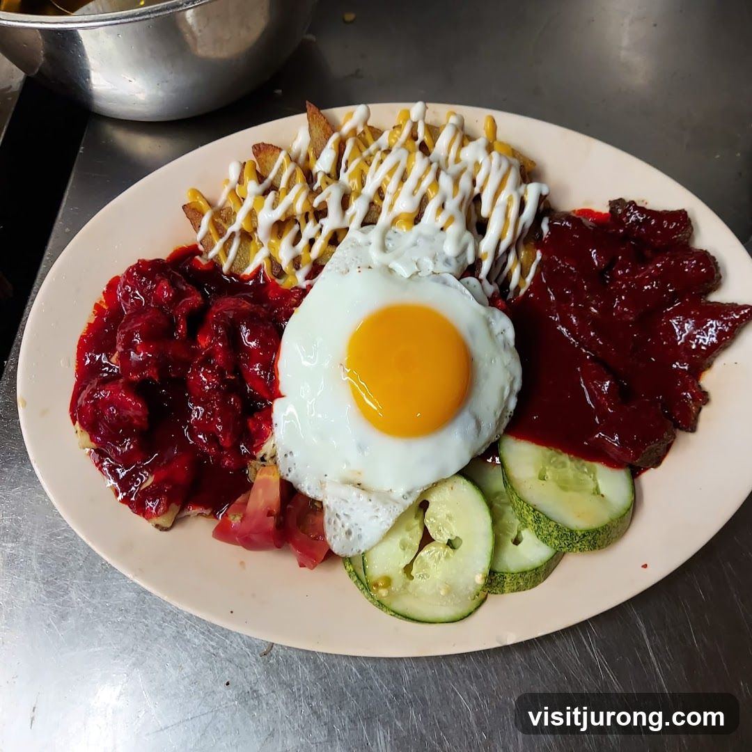 Plate of Food with Fried Egg and Fries