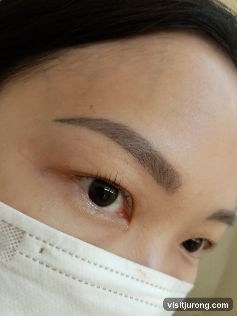 Close-up of a woman's eye and eyebrow