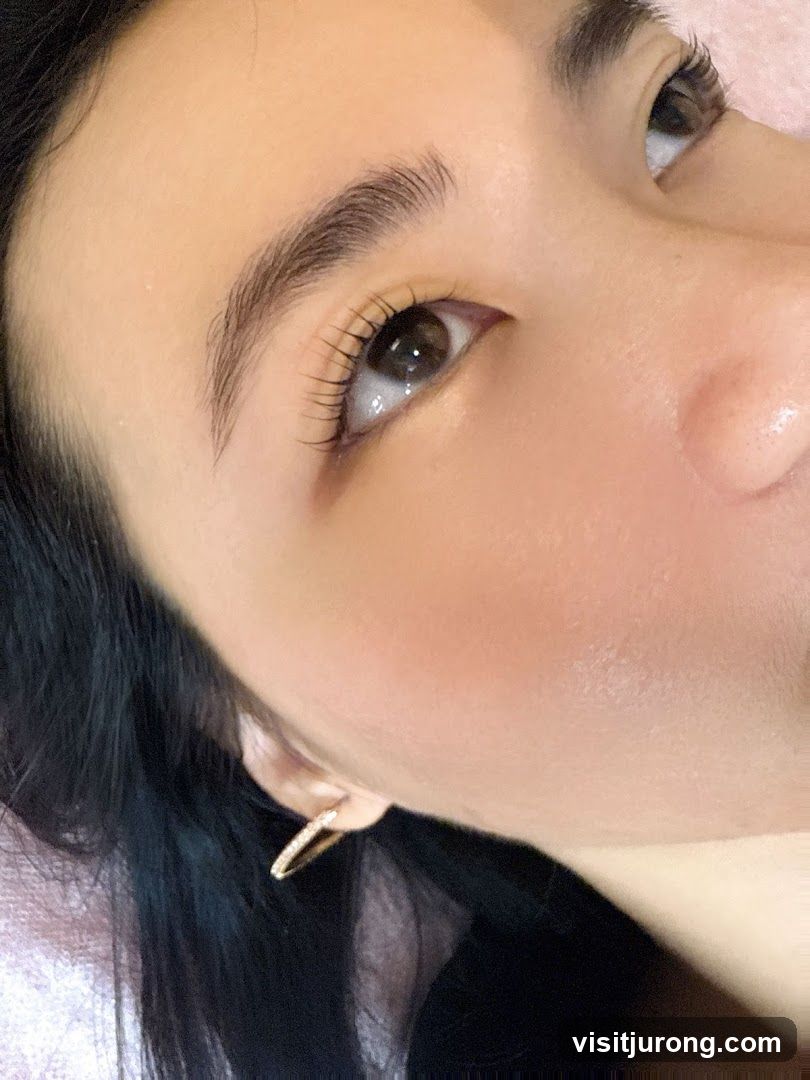 Close-up of a woman's eye with eyelash extensions