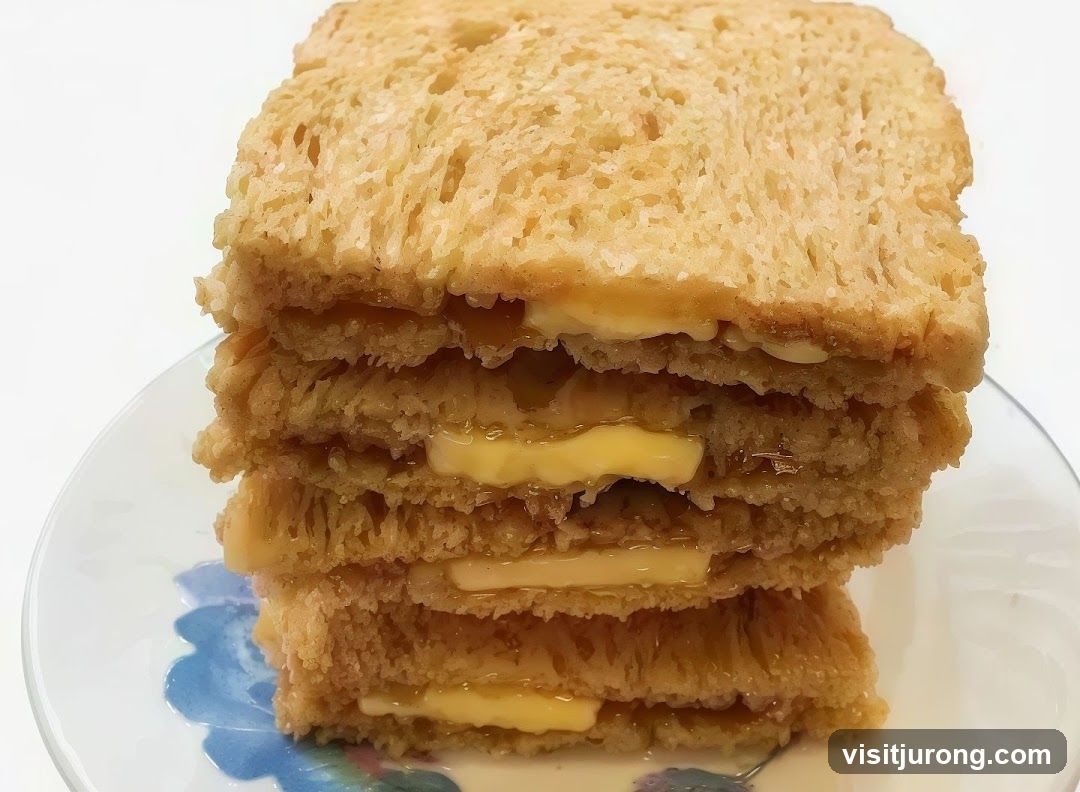 Stack of Buttered Toast with Honey