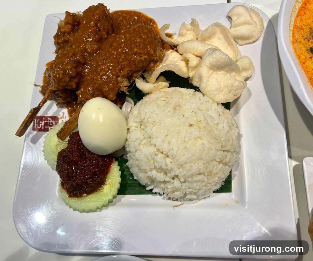 Nasi Lemak with Chicken Rendang